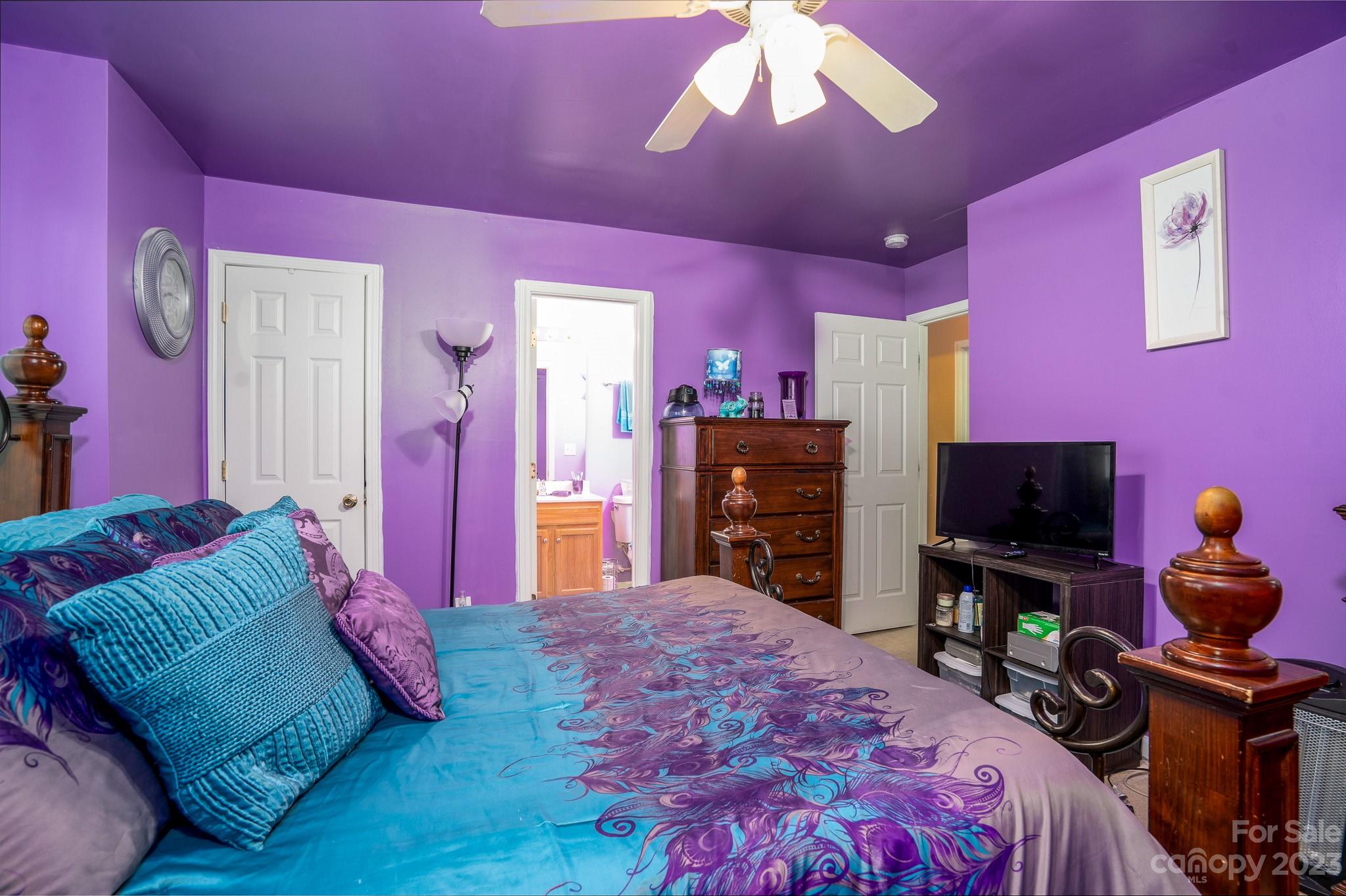907 McDonald Road Charlotte, NC 28214 - Photo 20 of 28 a bedroom with a bed and a flat screen tv