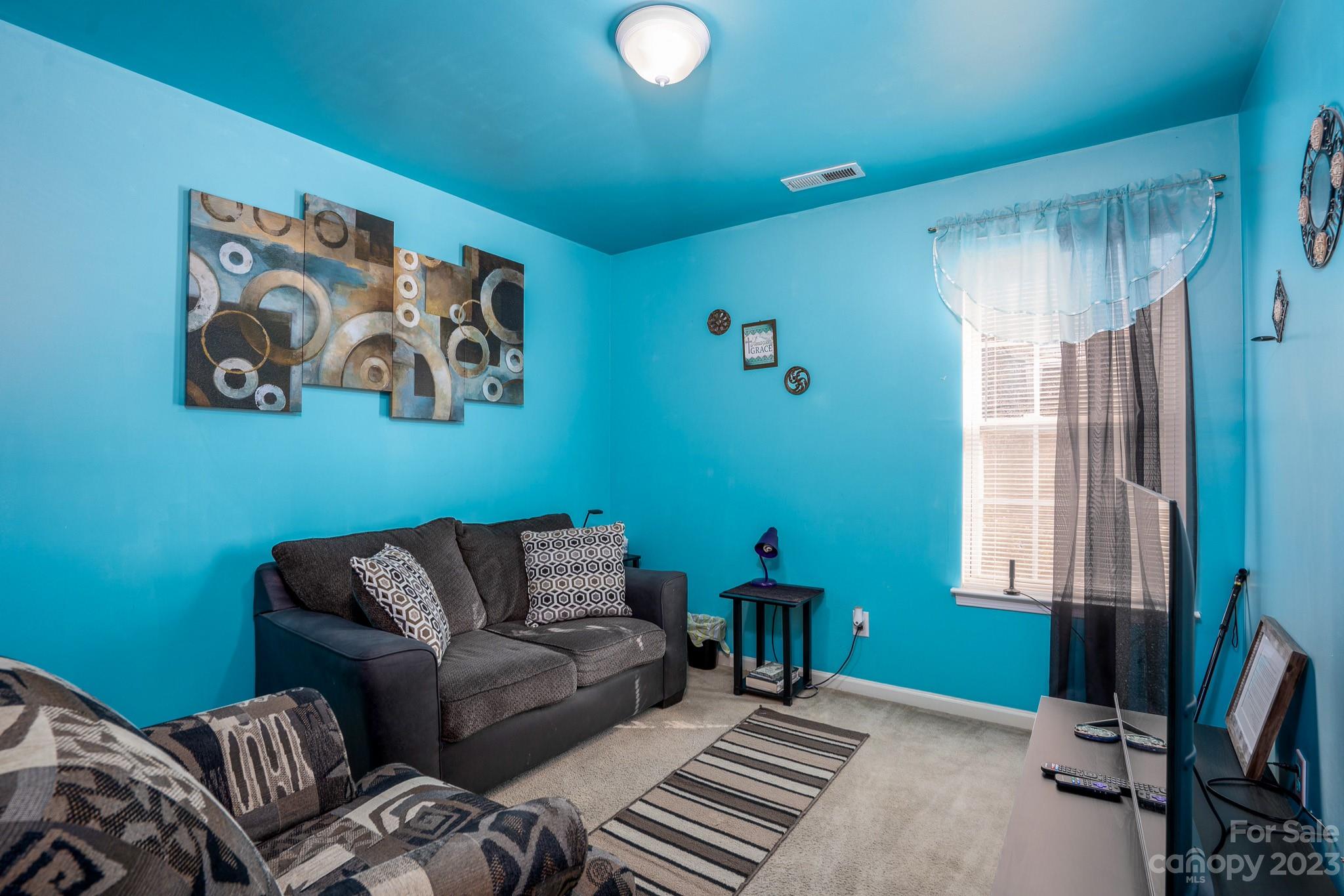 907 McDonald Road Charlotte, NC 28214 - Photo 25 of 28 a living room with furniture and a window