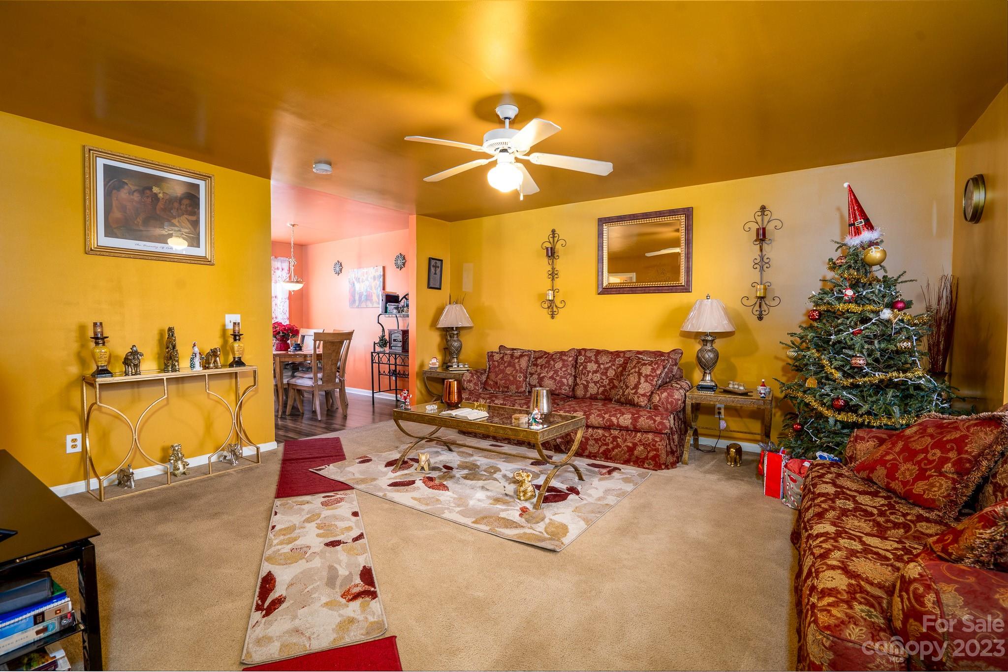 907 McDonald Road Charlotte, NC 28214 - Photo 4 of 28 a living room with furniture and a potted plant