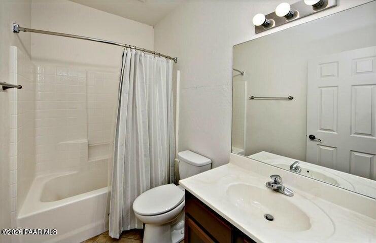 650 North Robles Street Dewey, AZ 86327 - Photo 12 of 13 a bathroom with a sink toilet and shower