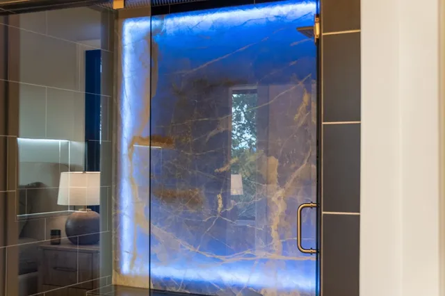 a kitchen with a table and chairs