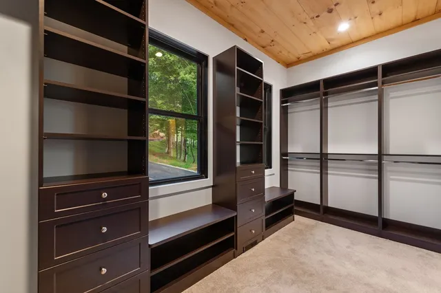 a view of swimming pool with furniture