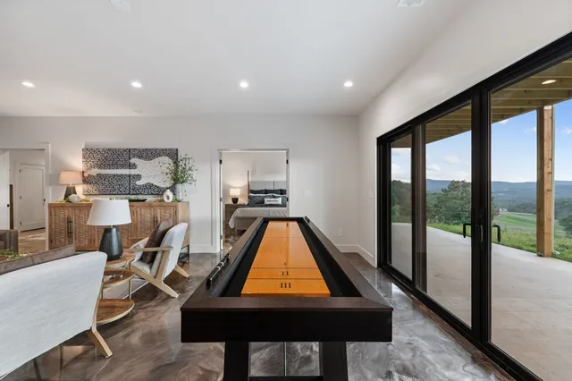 a bedroom with a bed and cabinets