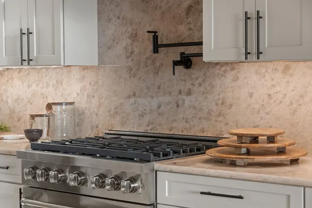 a balcony with furniture and wooden floor