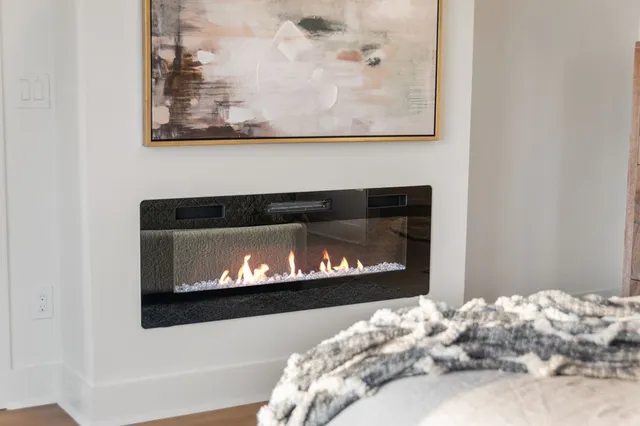 a backyard of a house with a tree