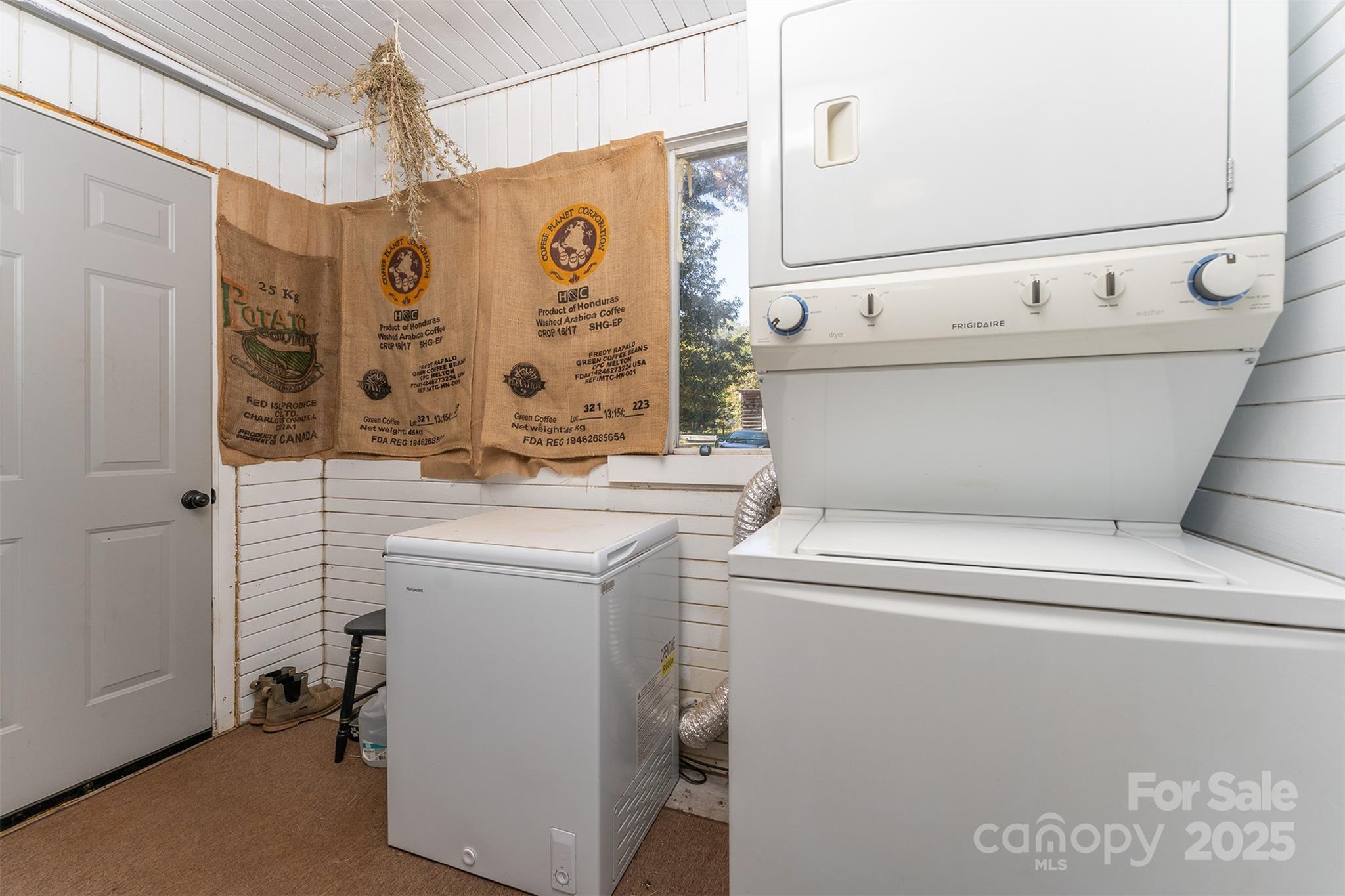 1434 Lake Adger Road Mill Spring, NC 28756 - Photo 19 of 48 a utility room with dryer and washer