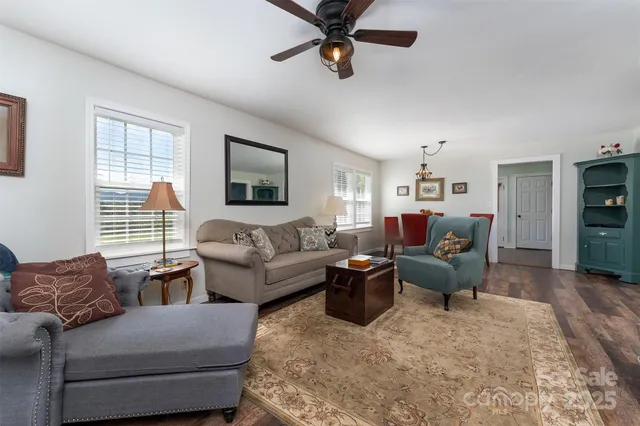 a living room with furniture or couch and a window