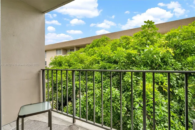 a balcony with a yard