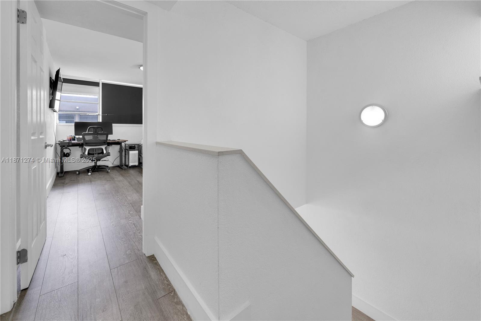 830 Northwest 87th Avenue, Unit 406 Miami, FL 33172 - Photo 32 of 40 a view of a livingroom with furniture and a floor to ceiling window