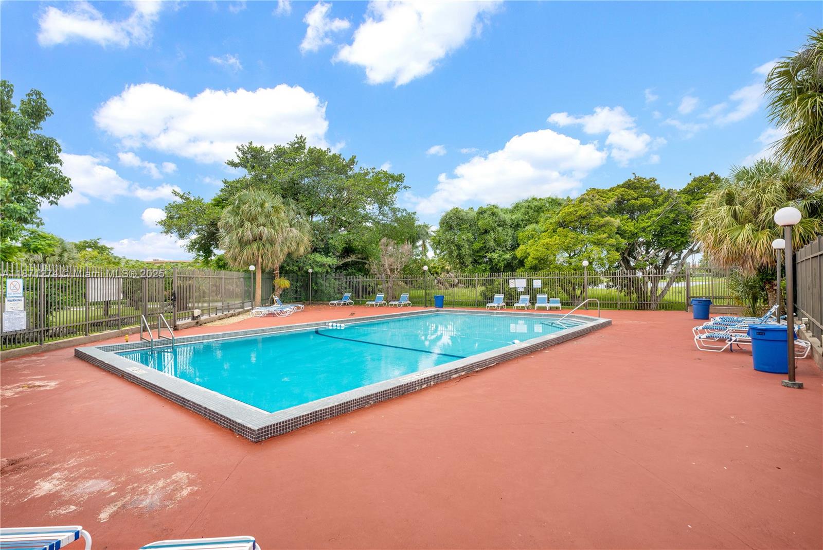 830 Northwest 87th Avenue, Unit 406 Miami, FL 33172 - Photo 34 of 40 a view of a tennis court