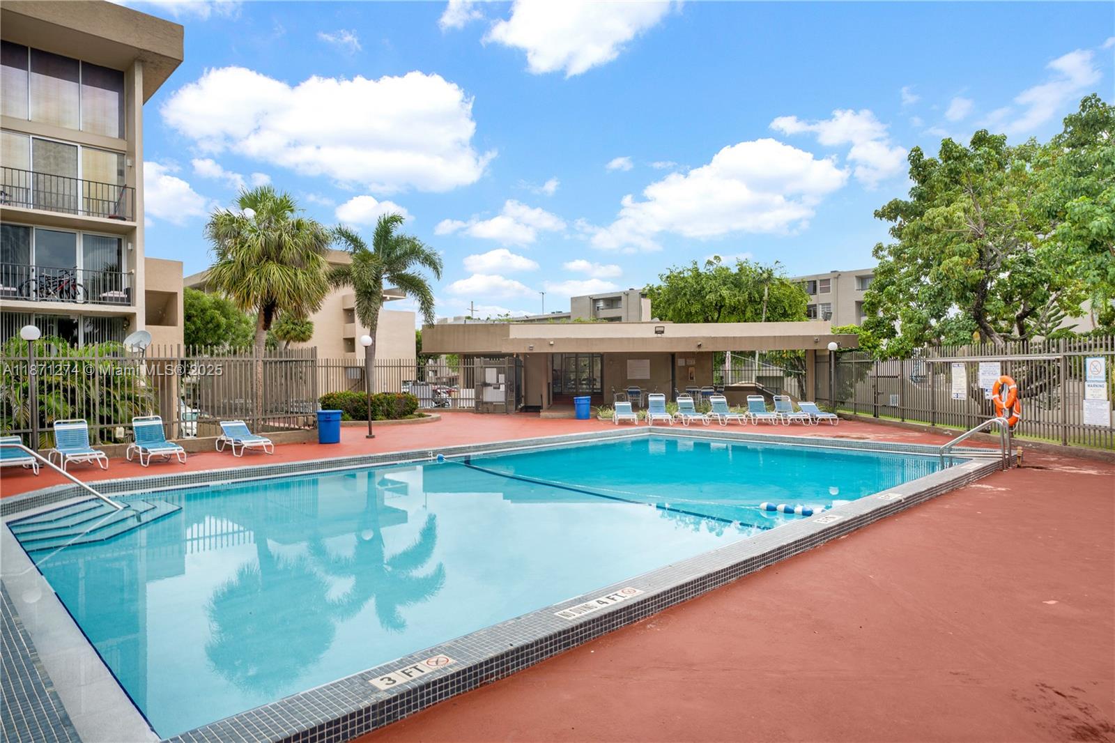 830 Northwest 87th Avenue, Unit 406 Miami, FL 33172 - Photo 35 of 40 swimming pool view with sitting space and garden view