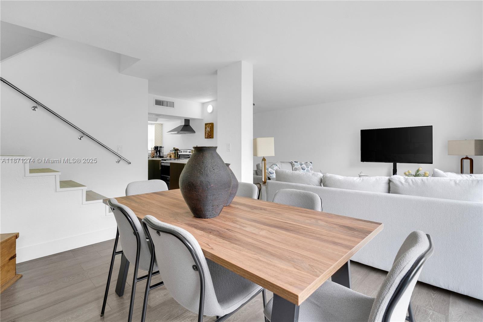 830 Northwest 87th Avenue, Unit 406 Miami, FL 33172 - Photo 10 of 40 a view of a dining room with furniture