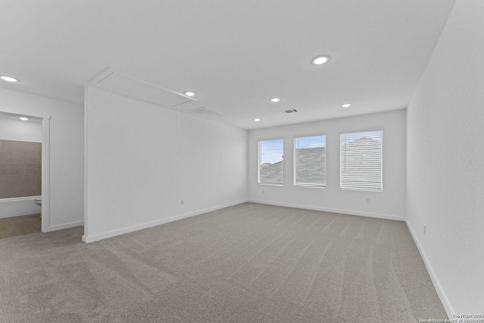 1875 Nuthatch Ridge New Braunfels, TX 78130 - Photo 21 of 34 a view of an empty room with a window