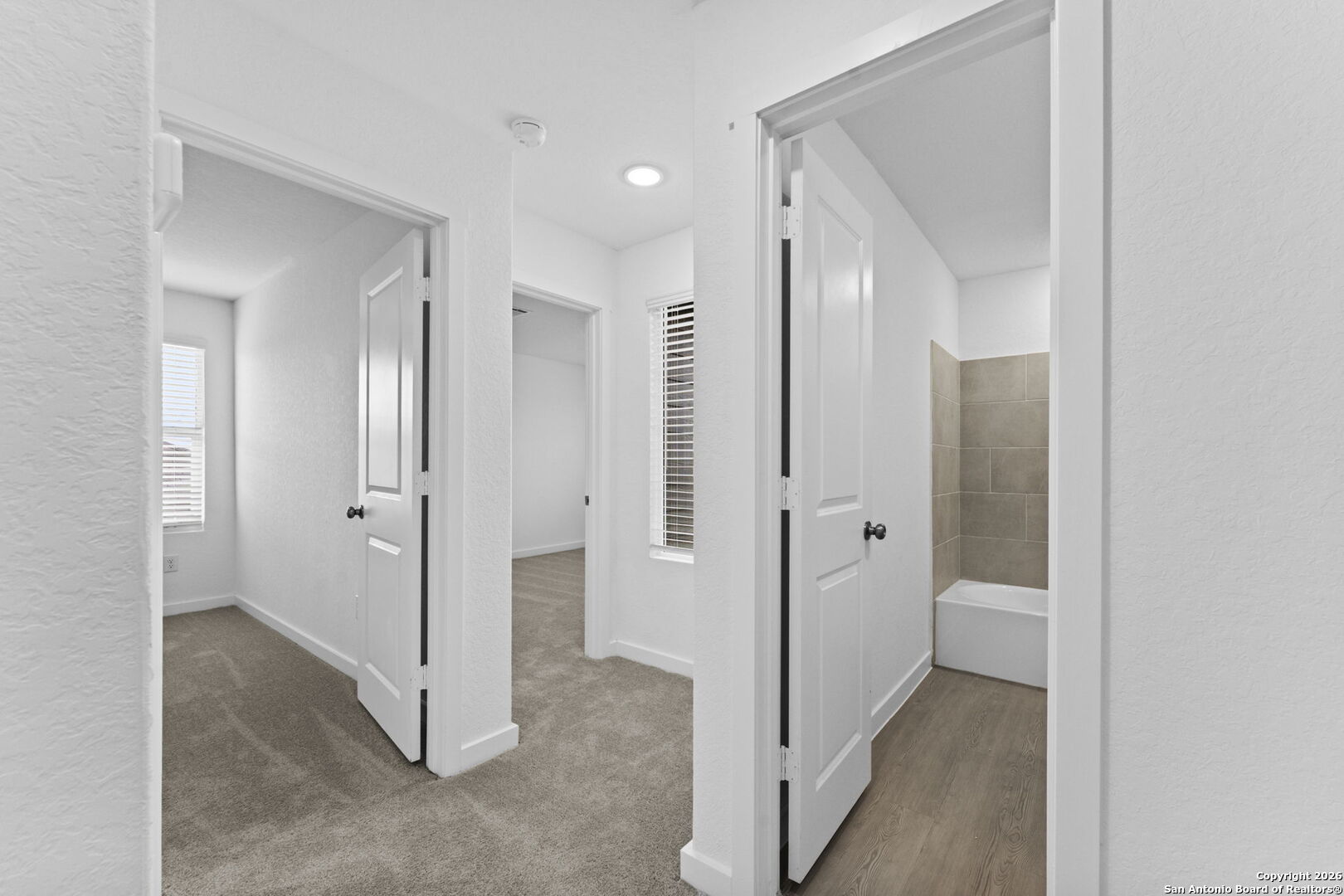 1875 Nuthatch Ridge New Braunfels, TX 78130 - Photo 23 of 34 a view of a bathroom with a glass door shower