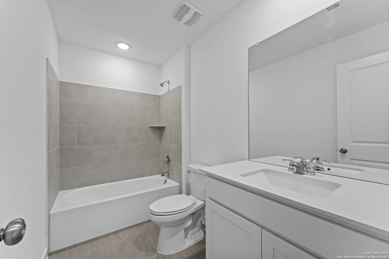 1875 Nuthatch Ridge New Braunfels, TX 78130 - Photo 24 of 34 a bathroom with a bathtub shower sink vanity mirror and toilet