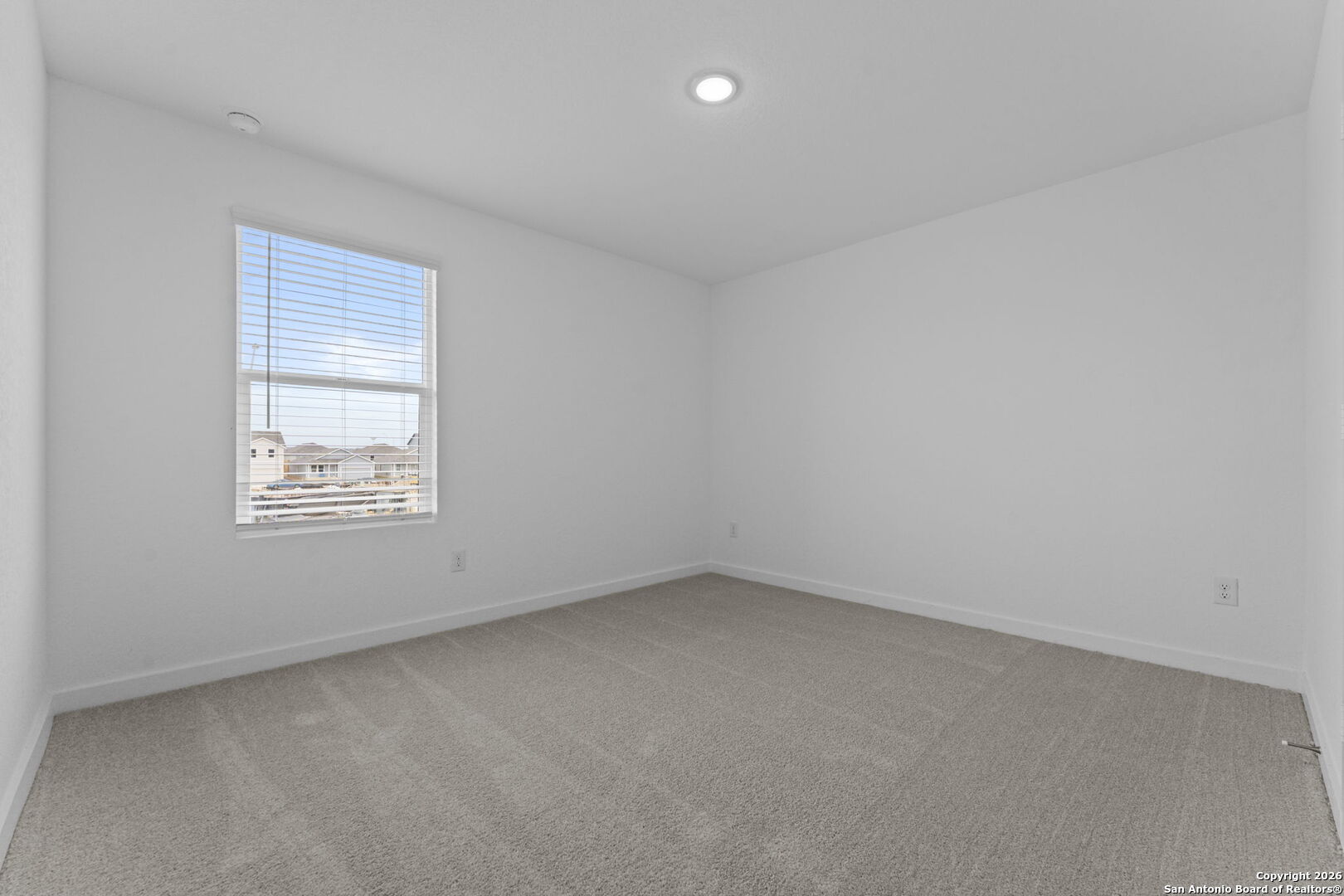 1875 Nuthatch Ridge New Braunfels, TX 78130 - Photo 30 of 34 an empty room with a window