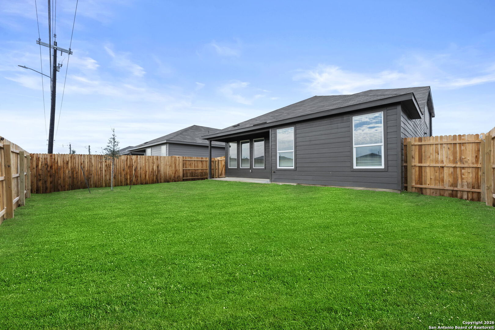 1875 Nuthatch Ridge New Braunfels, TX 78130 - Photo 32 of 34 a front view of house with a garden