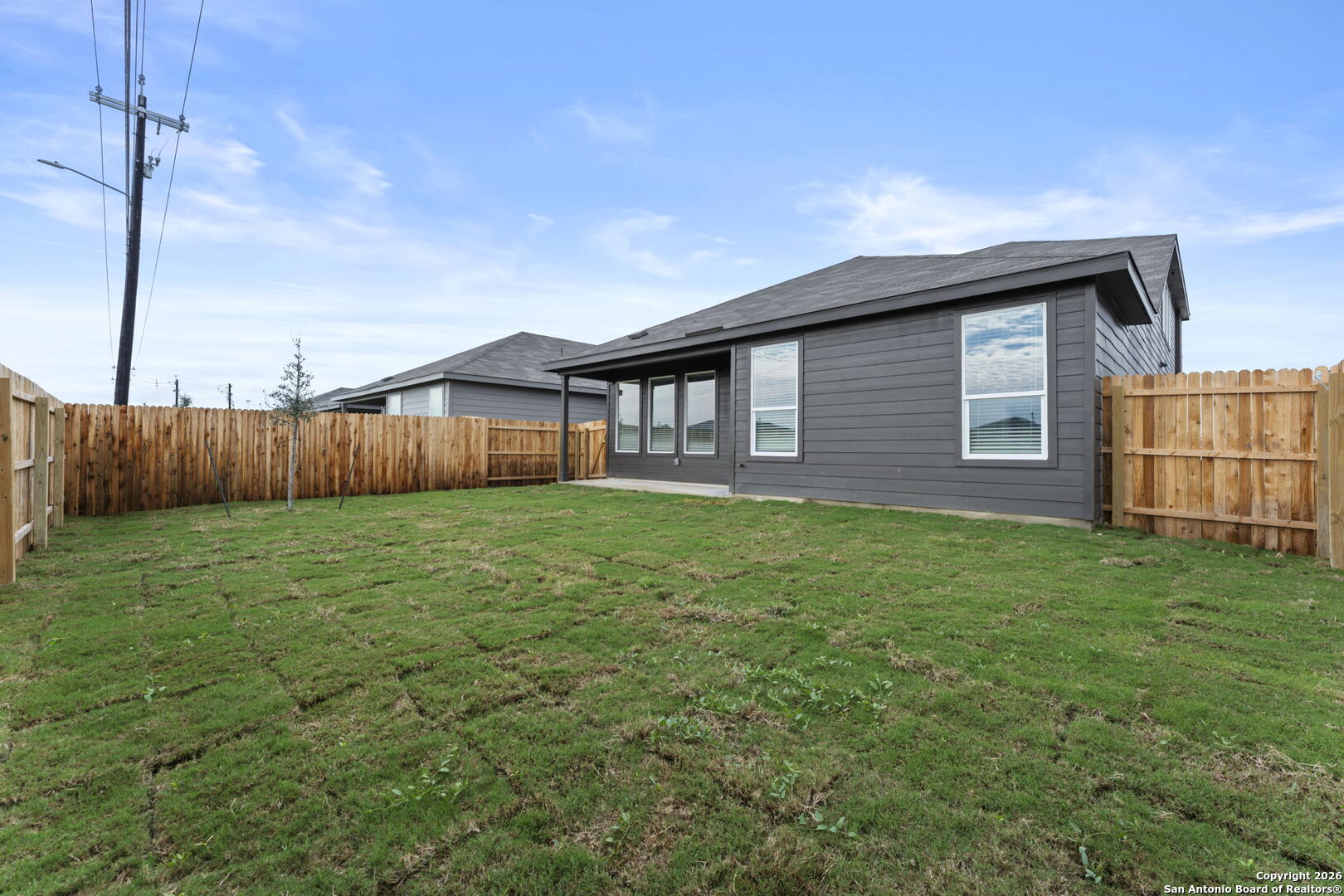 1875 Nuthatch Ridge New Braunfels, TX 78130 - Photo 33 of 34 a front view of a house with a garden