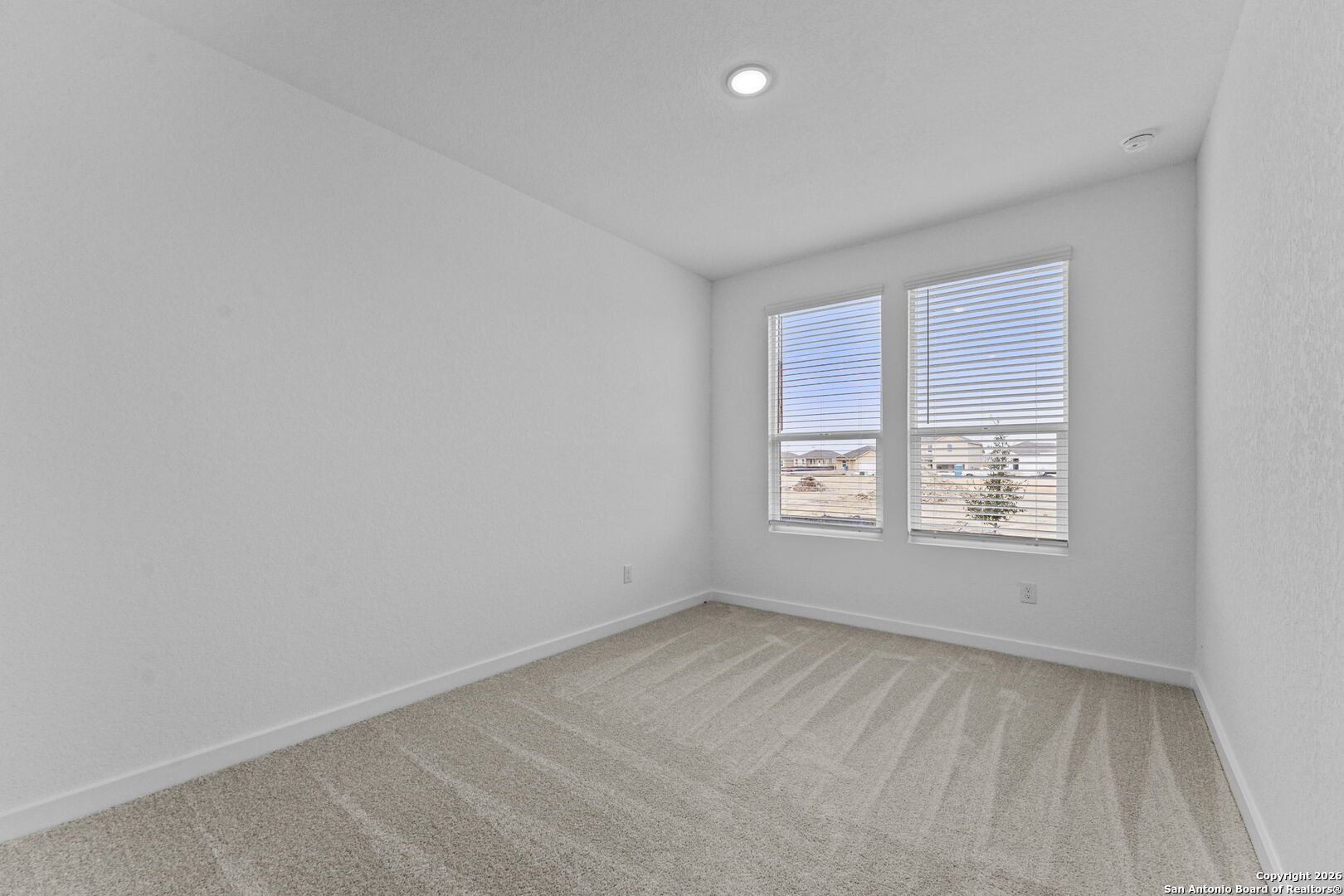 1875 Nuthatch Ridge New Braunfels, TX 78130 - Photo 5 of 34 an empty room with a window