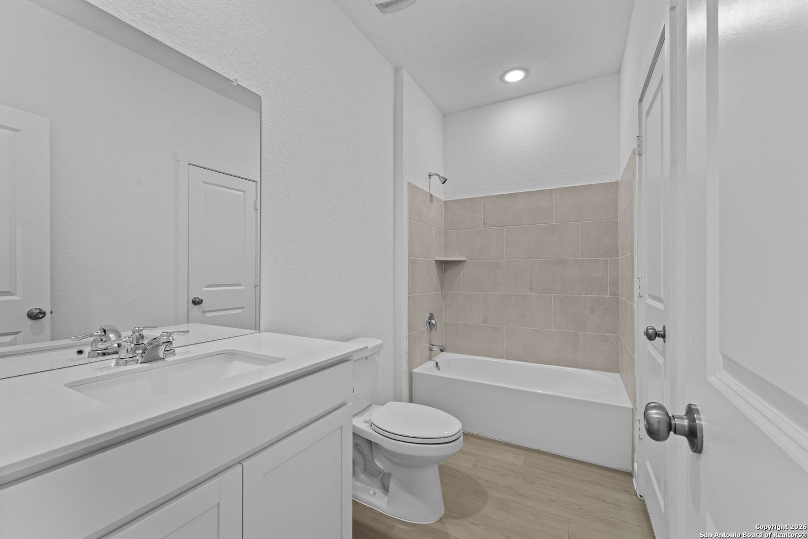 1875 Nuthatch Ridge New Braunfels, TX 78130 - Photo 7 of 34 a bathroom with a sink a toilet and shower