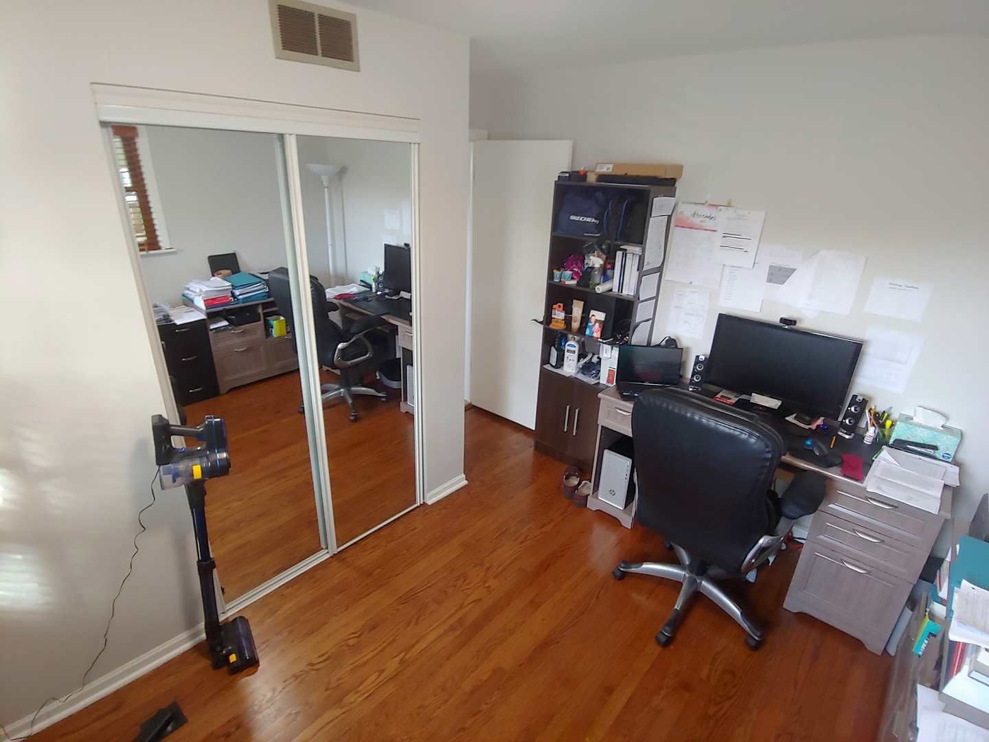 11016 Mansfield Avenue Chicago Ridge, IL 60415 - Photo 22 of 32 a view of a workspace with furniture and gym equipment