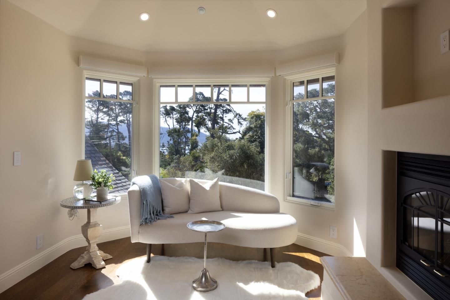 3957 Ronda Road Pebble Beach, CA 93953 - Photo 20 of 26 a living room with furniture and a large window