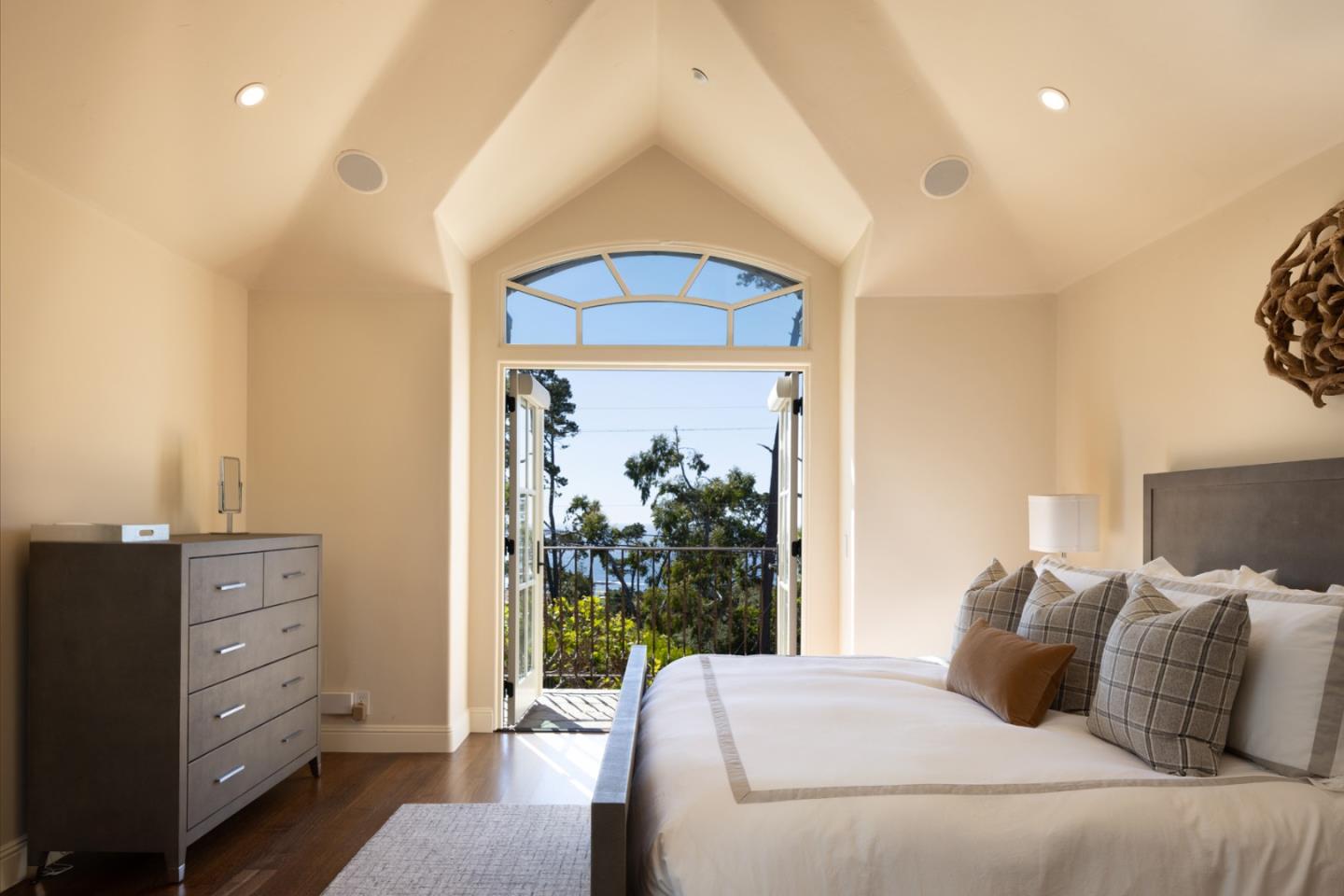 3957 Ronda Road Pebble Beach, CA 93953 - Photo 22 of 26 a bed room with a bed and a dresser