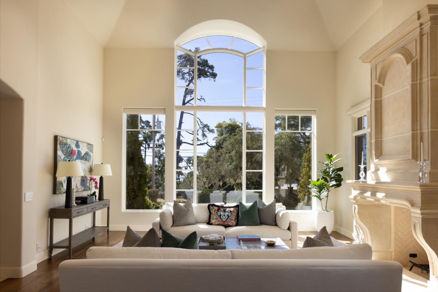 3957 Ronda Road Pebble Beach, CA 93953 - Photo 5 of 26 a living room with furniture and a large window