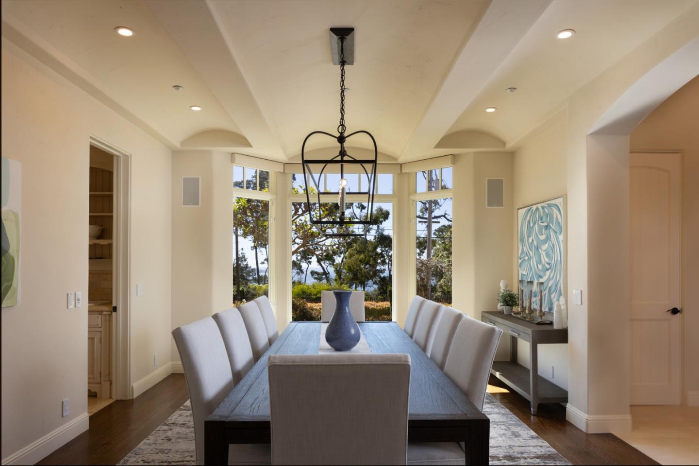 3957 Ronda Road Pebble Beach, CA 93953 - Photo 7 of 26 a view of a dining room with furniture window and wooden floor