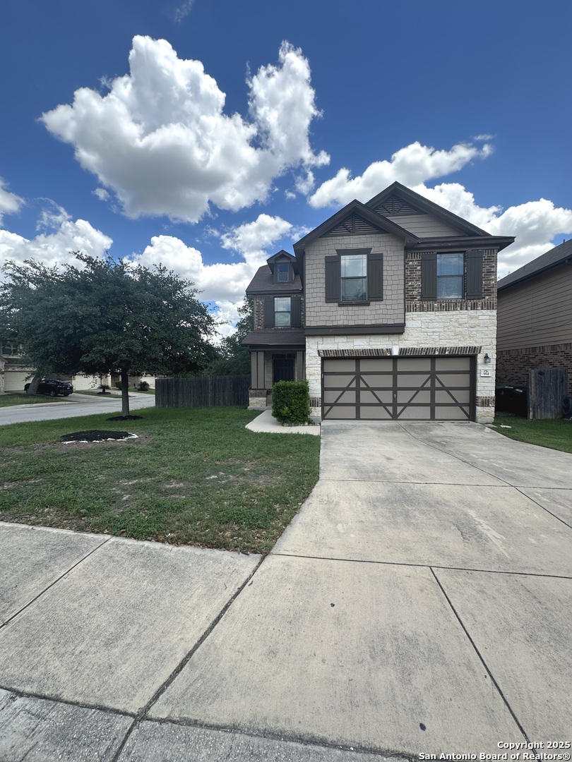 a front view of house with yard