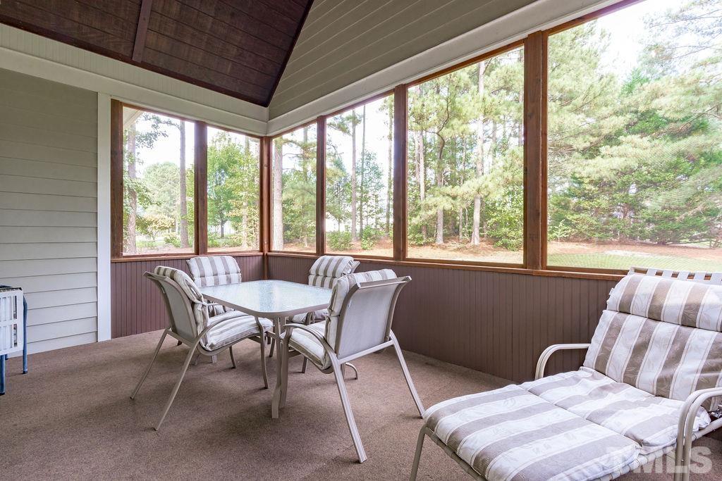 5725 Turner Store Lane Raleigh, NC 27603 - Photo 22 of 30 a view of a dining room with furniture window and outside view