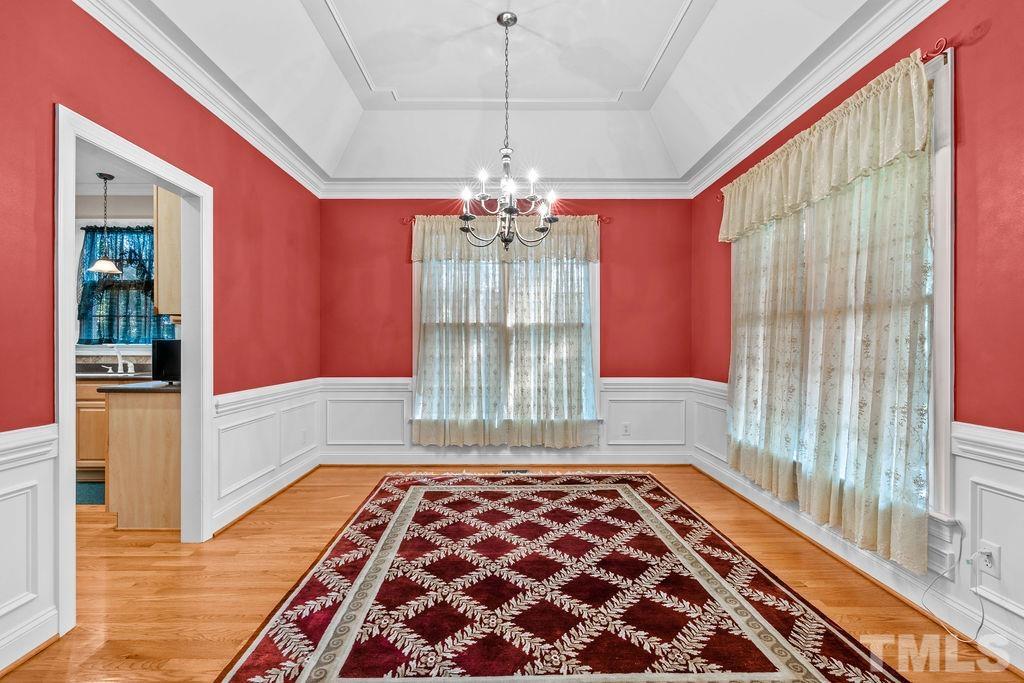 5725 Turner Store Lane Raleigh, NC 27603 - Photo 9 of 30 a very nice looking room with windows