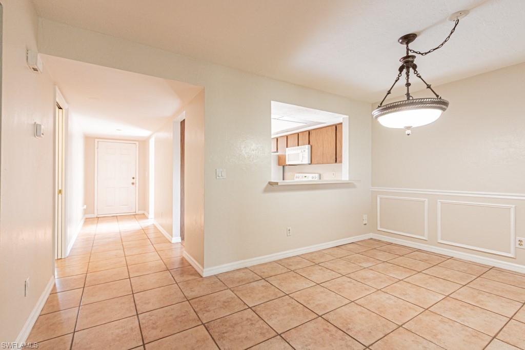 600 Misty Pines Circle, Unit F105 Naples, FL 34105 - Photo 11 of 49 Dining Area
