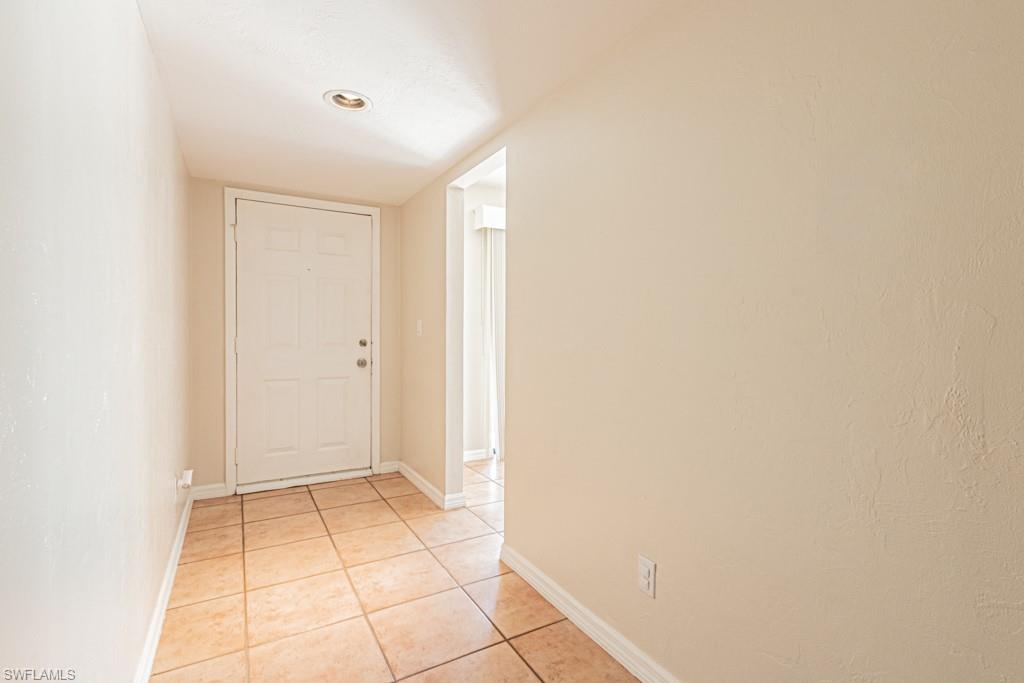 600 Misty Pines Circle, Unit F105 Naples, FL 34105 - Photo 5 of 49 Front Foyer