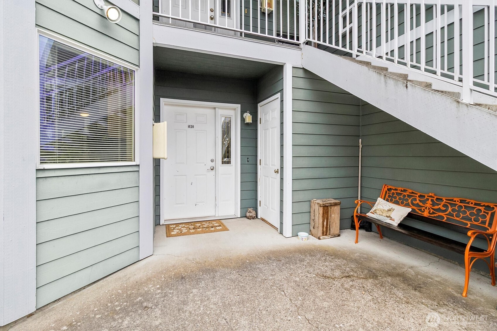344 East Bellis Fair Parkway Bellingham, WA 98226 - Photo 3 of 40 a view of a house with a door and wooden bench