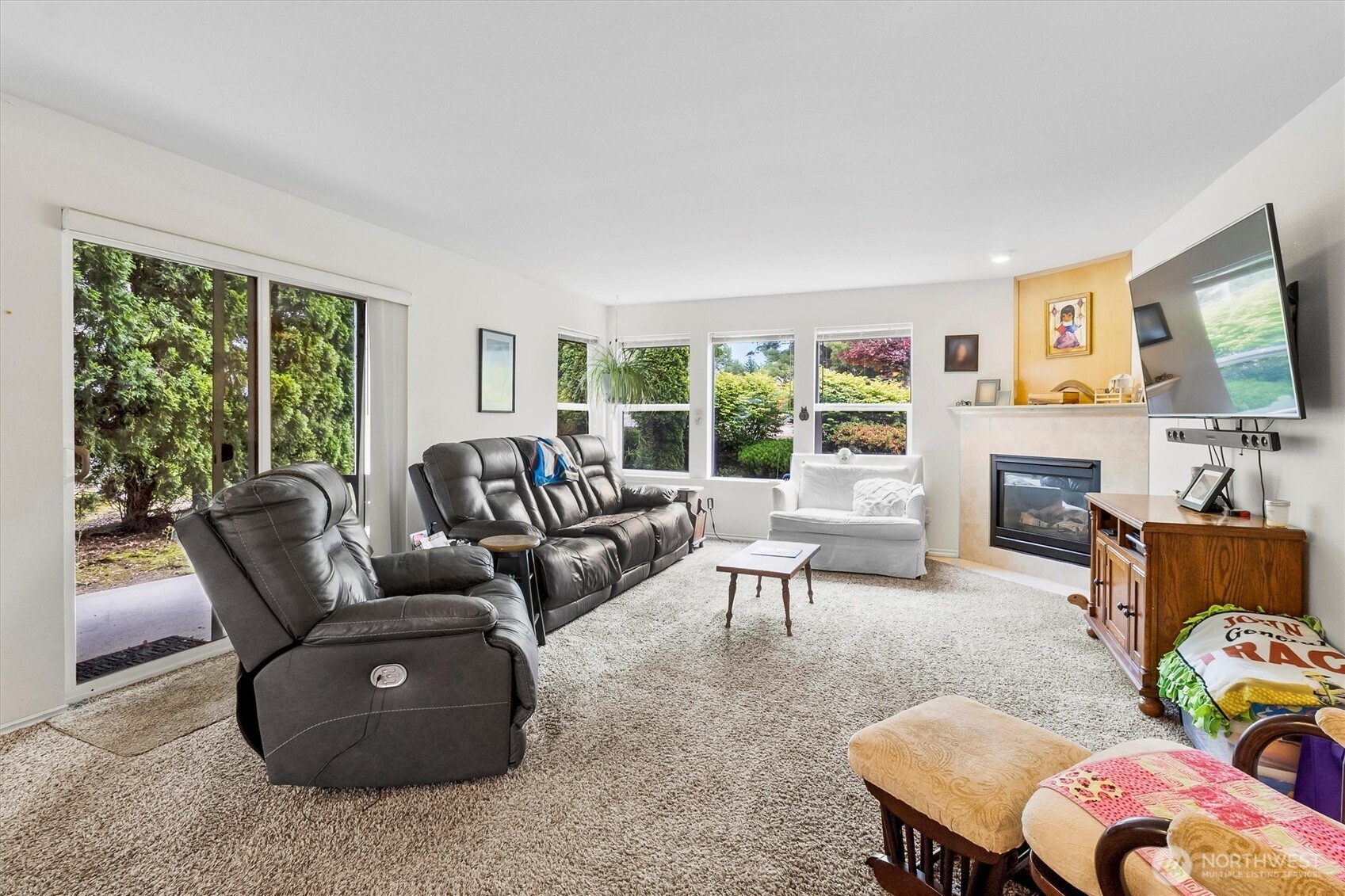 344 East Bellis Fair Parkway Bellingham, WA 98226 - Photo 6 of 40 a living room with furniture a fireplace and a large window