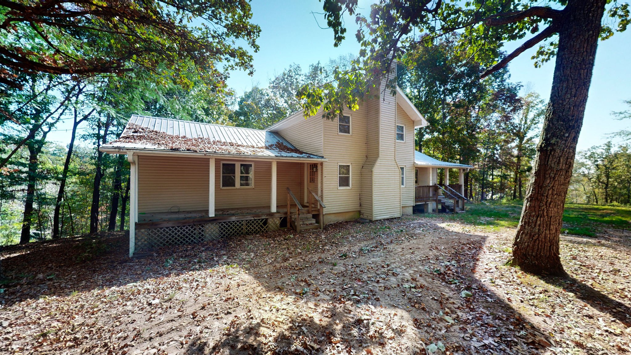 234 Bazzie Dock Road Dover, TN 37058 - Photo 3 of 47 a view of a house with a yard