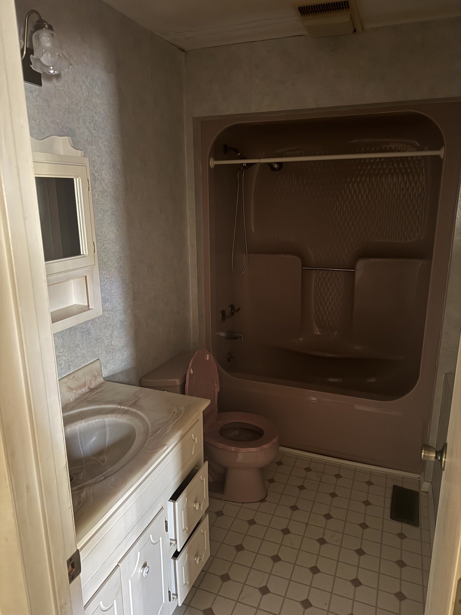 234 Bazzie Dock Road Dover, TN 37058 - Photo 36 of 47 a bathroom with a sink a toilet and shower