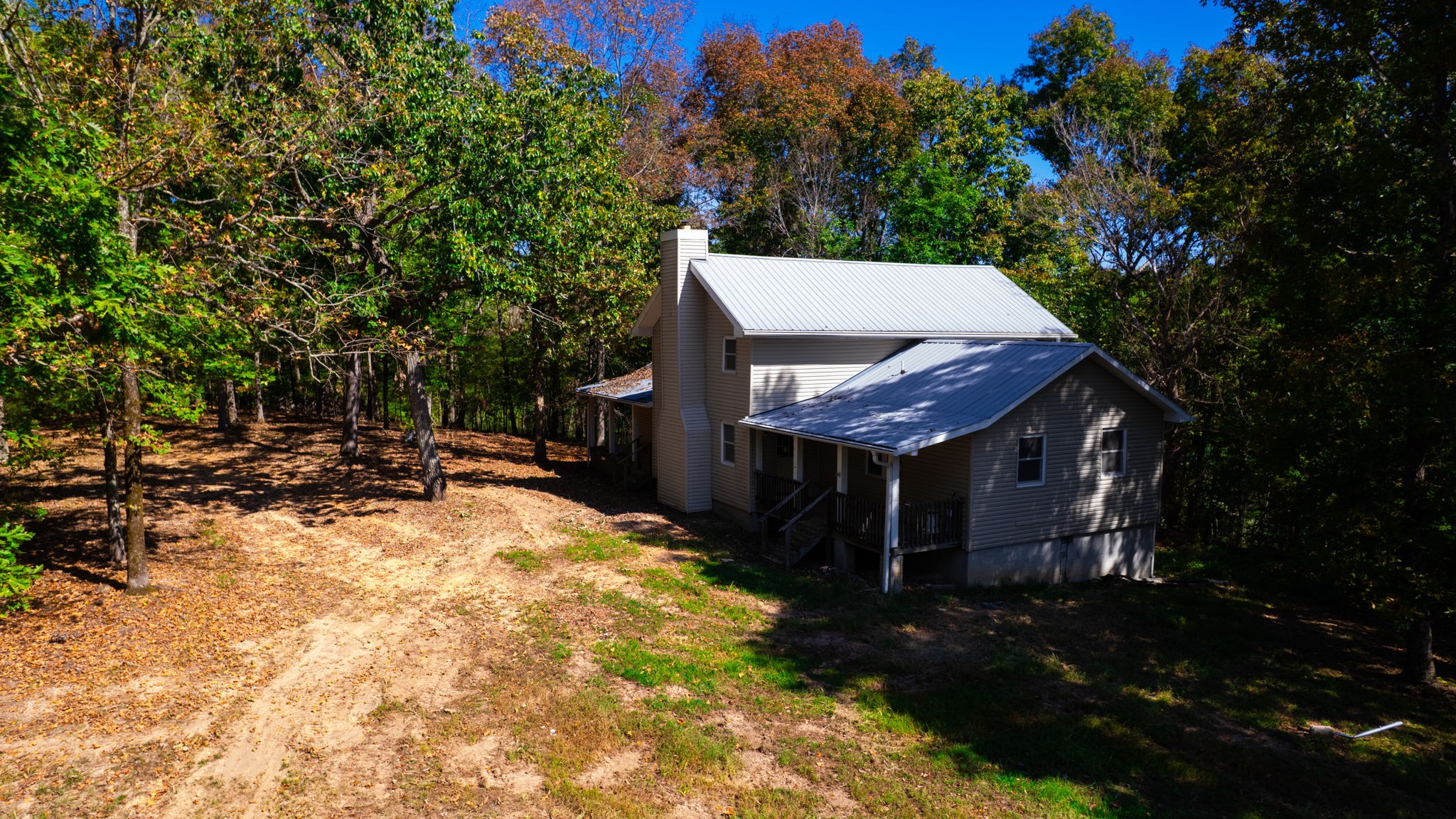 234 Bazzie Dock Road Dover, TN 37058 - Photo 7 of 47 a view of a backyard with sitting area