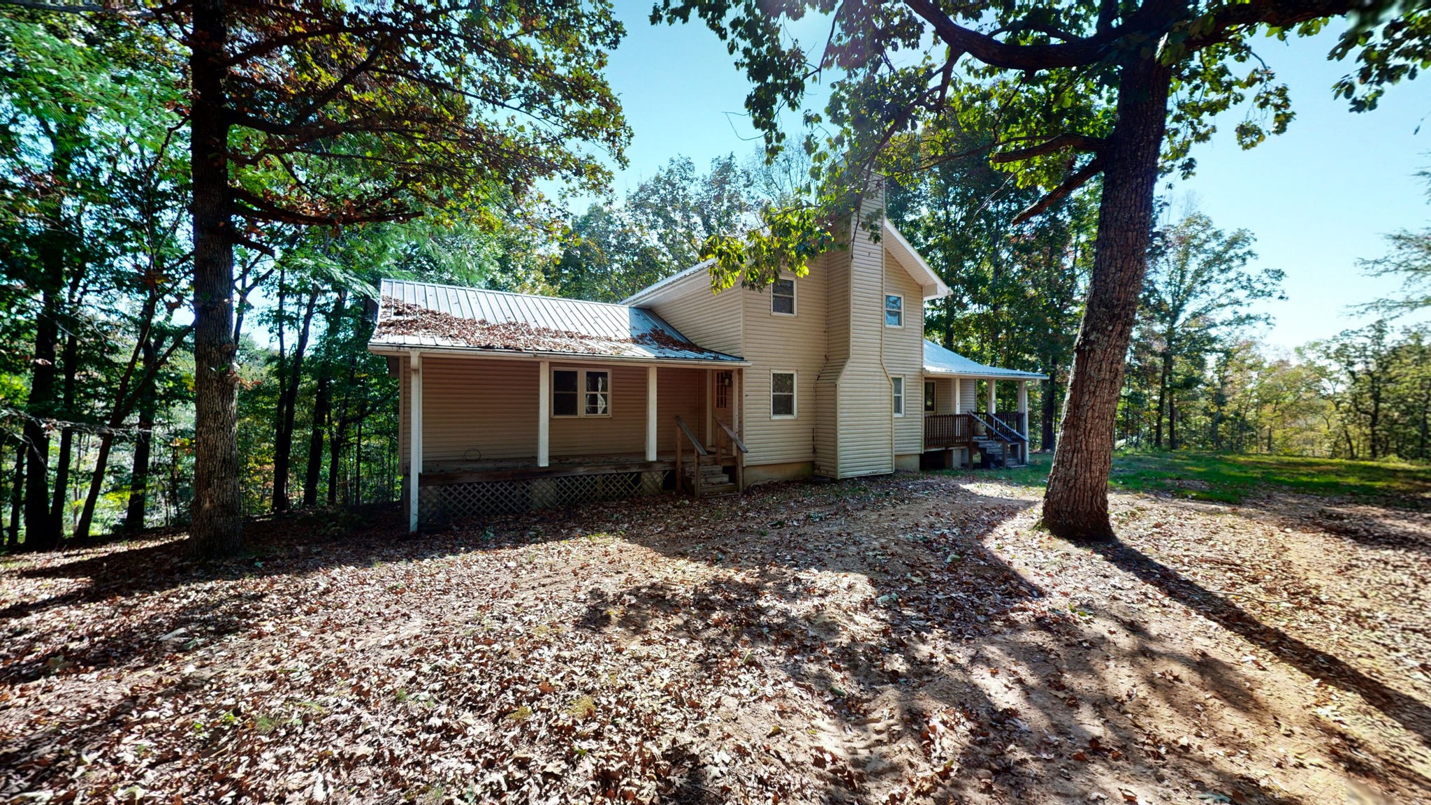 234 Bazzie Dock Road Dover, TN 37058 - Photo 8 of 47 a view of a house with a tree in the yard