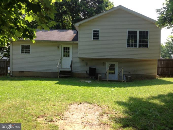 419 Burns Street Ranson, WV 25438 - Photo 2 of 22 a view of a house with a yard