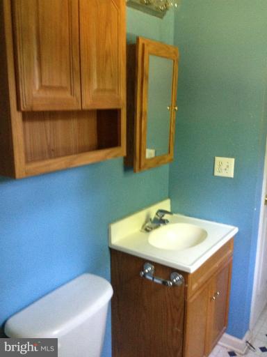 419 Burns Street Ranson, WV 25438 - Photo 11 of 22 a bathroom with a sink and a toilet