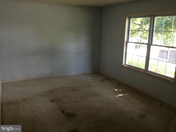 419 Burns Street Ranson, WV 25438 - Photo 13 of 22 an empty room with a window