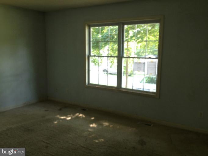 419 Burns Street Ranson, WV 25438 - Photo 15 of 22 a view of an empty room with a window