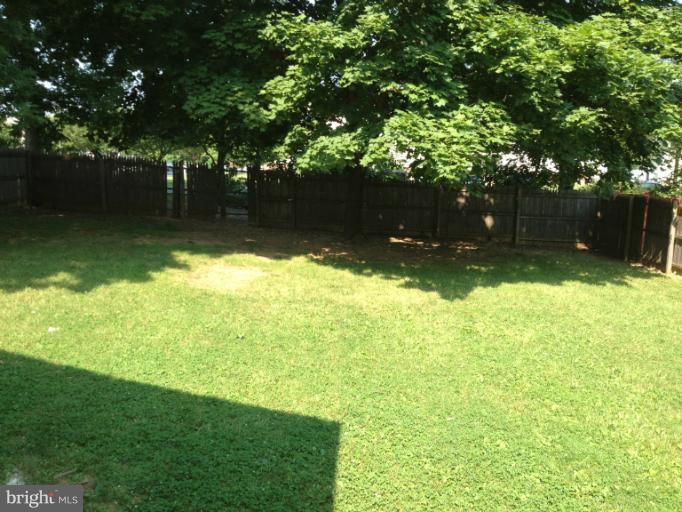 419 Burns Street Ranson, WV 25438 - Photo 17 of 22 a view of yard with green space