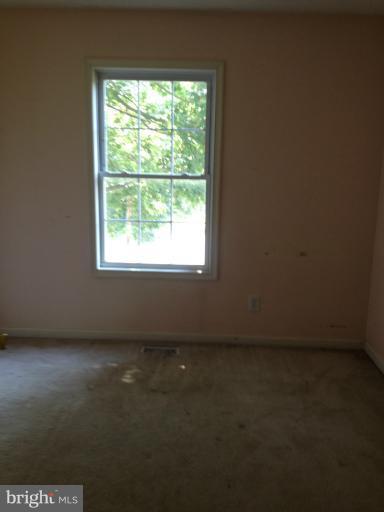 419 Burns Street Ranson, WV 25438 - Photo 21 of 22 an empty room with a window
