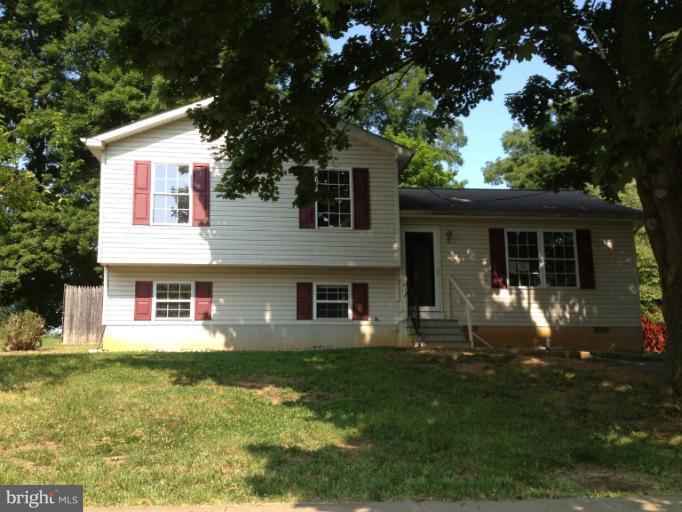 419 Burns Street Ranson, WV 25438 - Photo 22 of 22 a front view of a house with garden