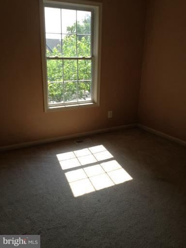 419 Burns Street Ranson, WV 25438 - Photo 4 of 22 an empty room with a window