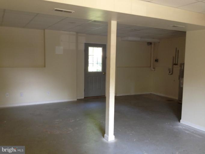 419 Burns Street Ranson, WV 25438 - Photo 6 of 22 an empty room with windows