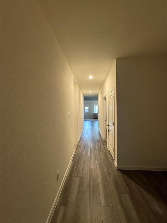 1852 McCree Street Forney, TX 75126 - Photo 12 of 21 a view of a hallway with wooden floor